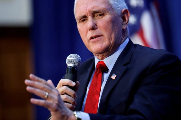 FILE PHOTO: U.S. former Vice President Mike Pence sits for an onstage interview after his remarks on abortion, ahead of Supreme Court arguments in the Dobbs v. Jackson Women's Health Organization case involving a Mississippi abortion law, at the National Press Club in Washington, U.S. November 30, 2021. REUTERS/Jonathan Ernst/File Photo