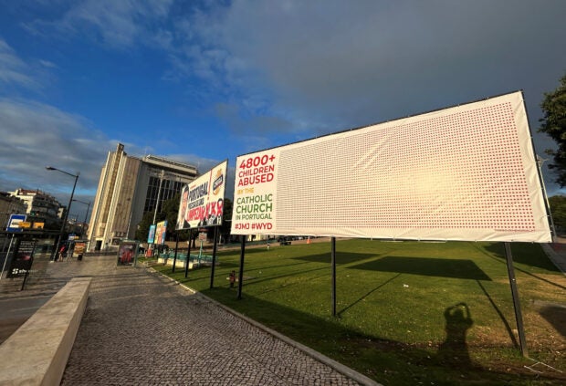 Huge billboard in Lisbon puts spotlight on clergy abuse as Pope Francis arrives