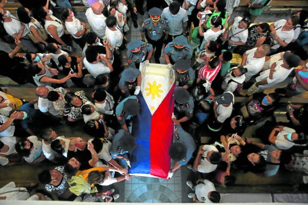 Thousands of people line the streets and attend the funeral of Negros Oriental Gov. Roel Degamo