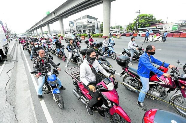 A party-list lawmaker representing motorcycle riders has called on the Metropolitan Manila Development Authority (MMDA) to defer the imposition of a P500 fine on motorcycle riders huddling under flyovers and pedestrian footbridges during heavy rain.