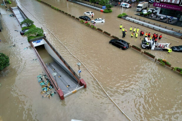 Weaker Doksuri drenches north China